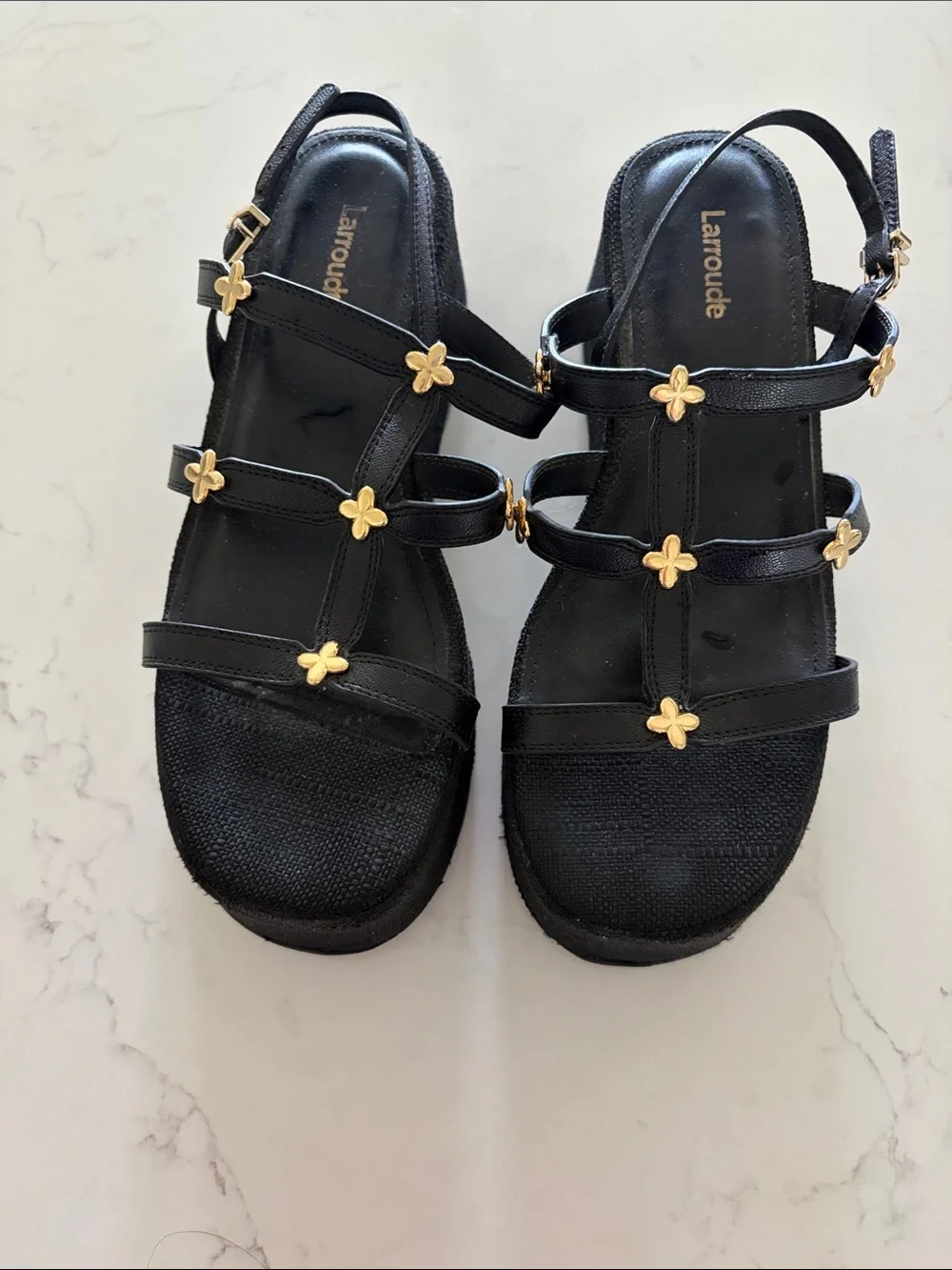 Larroude Black Harmony Sandals with Gold Flower Accents